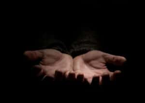 Exploring the Transformational Power of Surrender Surrender all with hands touching palms up